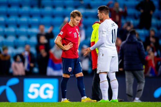 Martin Ødegaard of Norway and Luka Jovic of Serbia