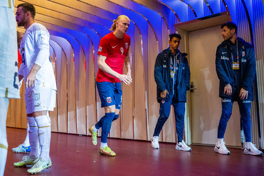 Erling Braut Haaland and physio Mario Pafundi of Norway at