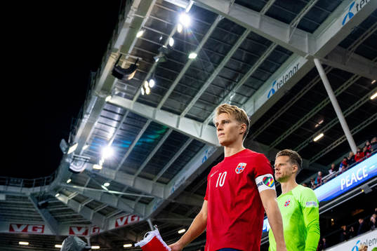 Martin Ødegaard and goalkeeper Ørjan Håskjold Nyland of