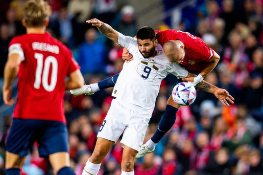 Aleksandar Mitrovic of Serbia and Leo Skiri Østigård of
