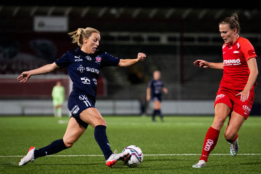 Mimmi Larsson of FC Rosengård and Martine Østenstad of