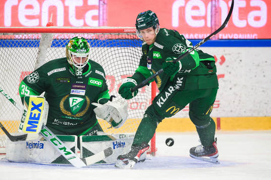 Färjestads målvakt Dennis Hildeby och Mattias Göransson