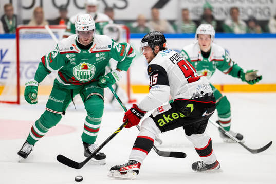 Malmö Redhawks Carl Persson och Rögles Kim Rosdahl