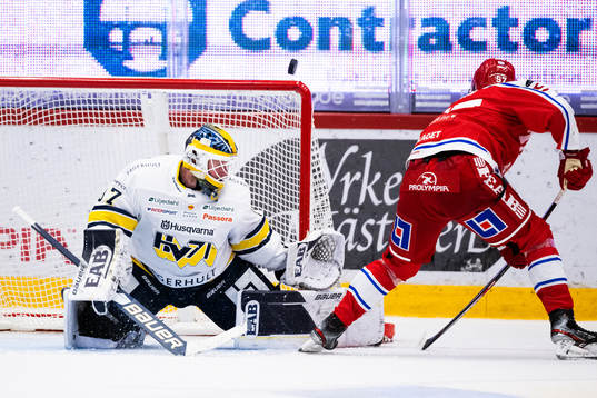 HV71s målvakt Jonas Gunnarsson och Timrås Anton Wedin
