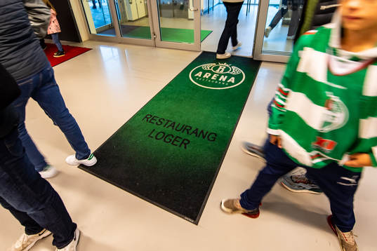En matta med text ”Resturang Loger”