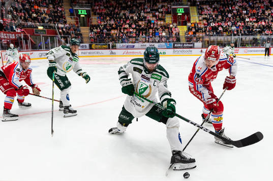 Färjestads Linus Johansson och Timrås Sebastian Hartmann