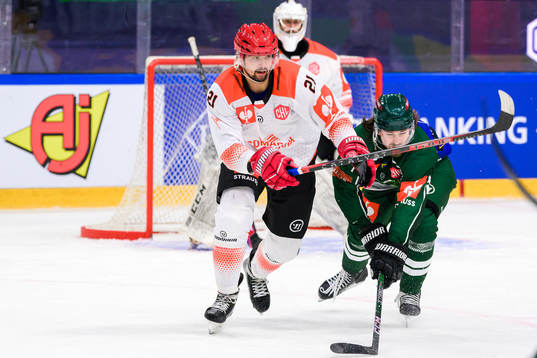 Marek Racuk of Cracovia and Linus Johansson of Färjestad