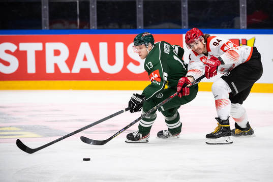 Daniel Viksten  of Färjestad and Stepan Csamango of
