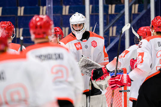 goaltender Rok Stojanovic of Cracovia looks dejected