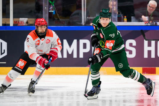 Patryk Wronka of Cracovia and Patrik Lundh of Färjestad