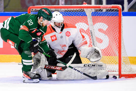 Marcus Westfält of Färjestad and goaltender Rok