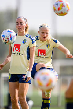 Kosovare Asllani and goalkeeper goalkeeper Emma Holmgren of