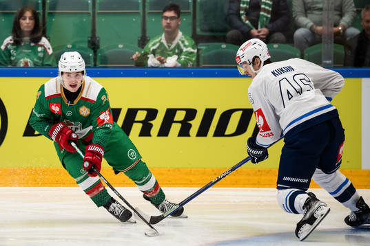 Marco Kasper of Rögle and Dean Kukan of ZSC Lions
