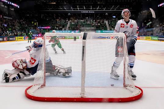 Simon Hrubec and Dean Kukan looks dejected