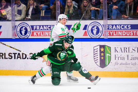 Rögles Adam Tambellini och Färjestads Per Åslund