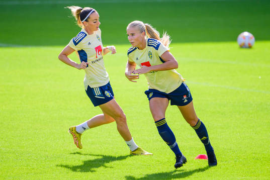 Kosovare Asllani and Stina Lennartsson of the Swedish