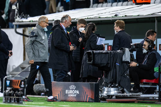 UEFA delegates discussing whether or not the match should