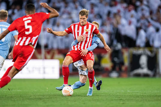 Kevin Behrens of Union Berlin and Anders Christiansen of