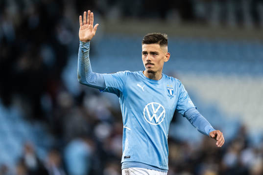 Dennis Hadzikadunic of Malmö FF looks dejected