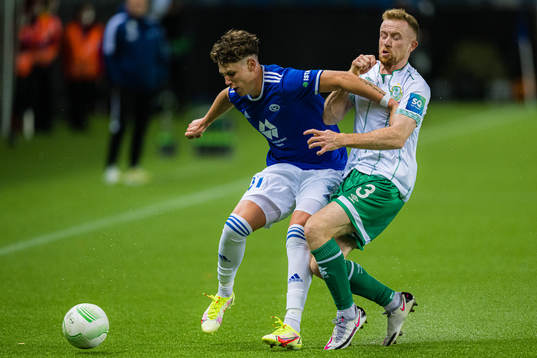 Mathias Løvik of Molde and Sean Hoare of Shamrock Rovers
