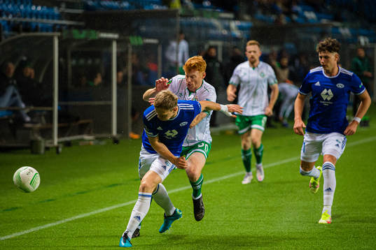 Eirik Haugan of Molde and Rory Gaffney of Shamrock Rovers