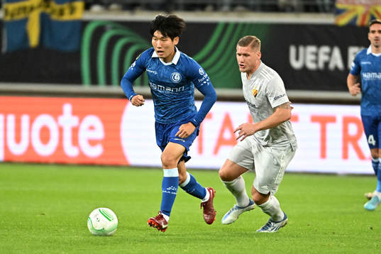 Hyunseok Hong of Gent battles and Victor Edvardsen of