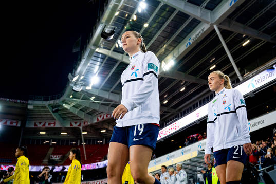 Elisabeth Terland and Anna Jøsendal of Norway enter the