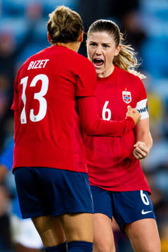Celin Bizet Ildhusøy of Norway celebrates with teammate