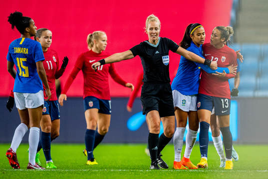 Tainara of Brazil, referee Lina Lehtovaara and Celin Bizet