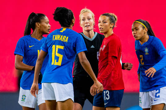 Tainara of Brazil, referee Lina Lehtovaara and Celin Bizet