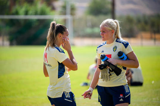 Johanna Rytting Kaneryd and goalkeeper Emma Holmgren of the