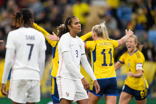 Wendie Renard of France looks dejected