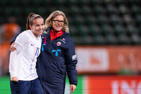 Guro Reiten and Head coach Hege Riise of Norway celebrate