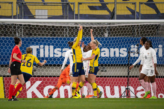 Amanda Ilestedt of Sweden celebrate with teammates