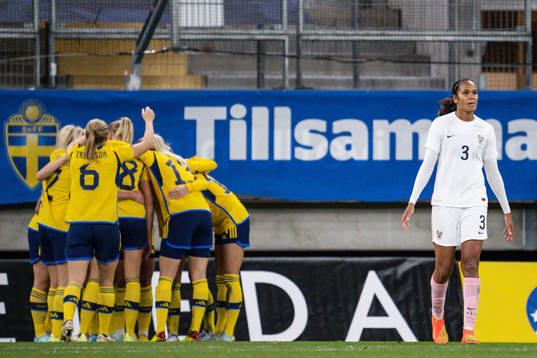 Wendie Renard of France looks dejected