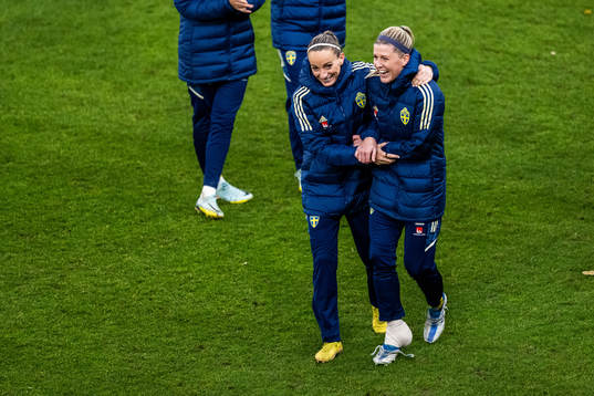 Kosovare Asllani and Olivia Schough of Sweden celebrate