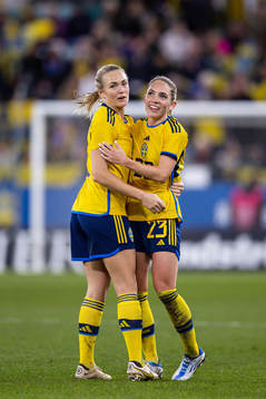 Magdalena Eriksson and Elin Rubensson of Sweden celebrate
