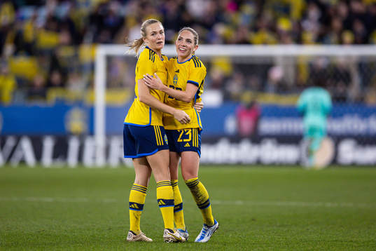 Magdalena Eriksson and Elin Rubensson of Sweden celebrate
