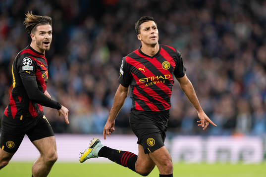 Jack Grealish and Rodri of Manchester City celebrate a goal