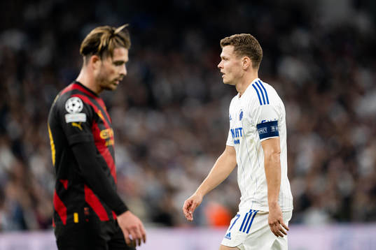 Jack Grealish of Manchester City and Viktor Claesson of