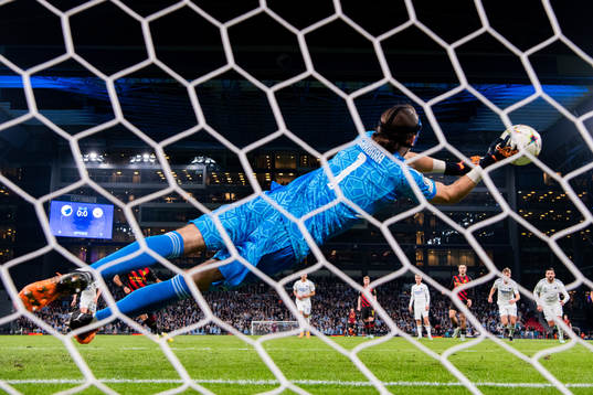 Goalkeeper Kamil Grabara of Copenhagen saves a penalty shot