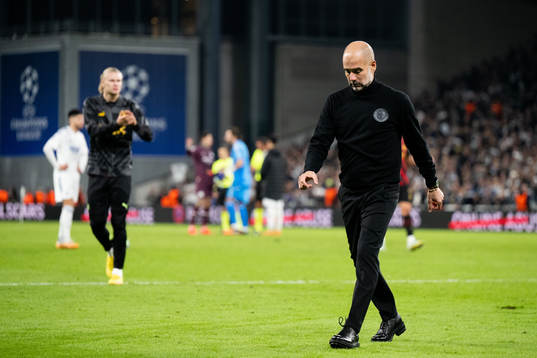 Head coach Pep Guardiola of Man City looks dejected