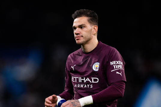 Goalkeeper Ederson of Man City looks dejected