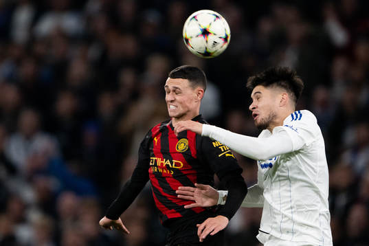 Phil Foden of Man City and Kevin Diks of Copenhagen