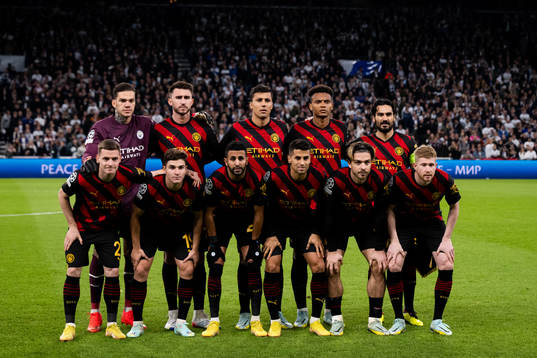 Players of Man City pose for a team photo