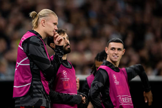 Erling Braut Haaland, Bernardo Silva and Phil Foden of Man