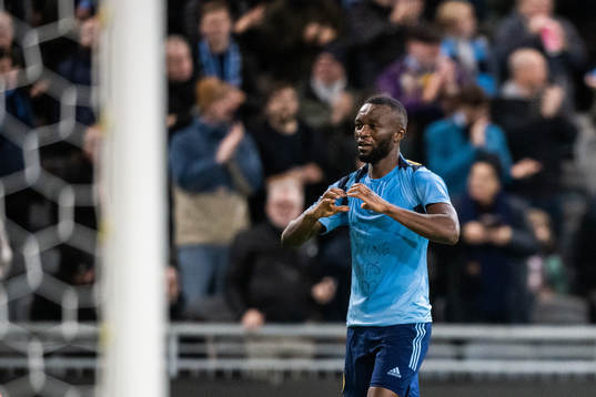 Emmanuel Justine Rabby Banda of Djurgården celebrates