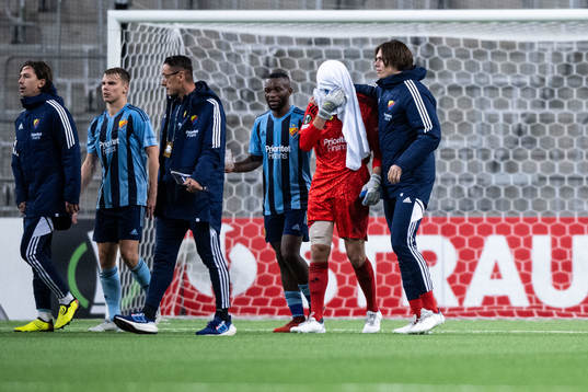 Goalkeeper Aleksandr Vasiutin of Djurgården in pain