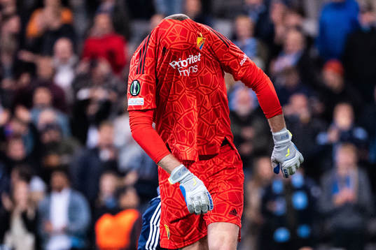 Goalkeeper Aleksandr Vasiutin of Djurgården looks dejected