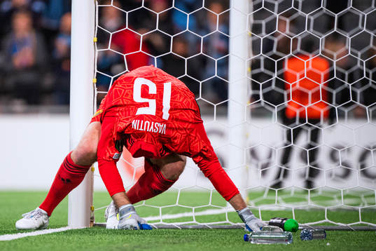 Goalkeeper Aleksandr Vasiutin of Djurgården in pain